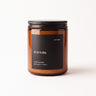 Not Frankie Filthy Floral soy candle in amber glass with black label featuring rhubarb, white florals, jasmine sambac and sandalwood fragrance.
